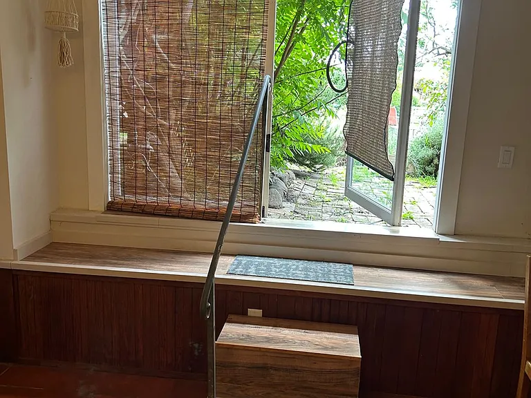 Door to large backyard