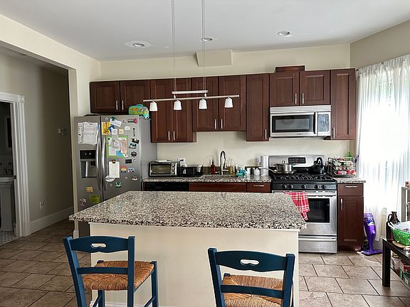 Granite countertops and tile floor