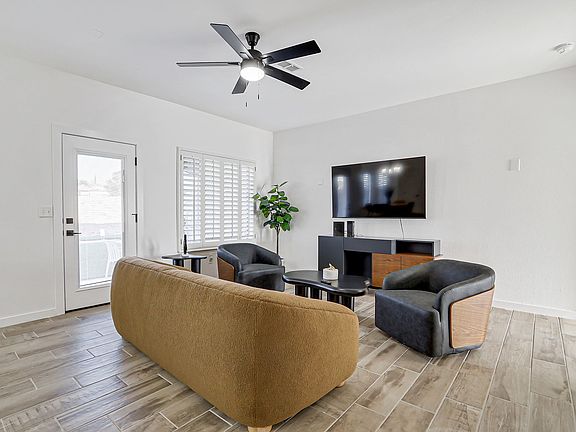 Comfortable open-concept living room with Smart TV.