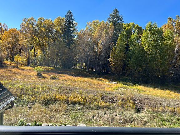 peaceful open space and river view from covered deck