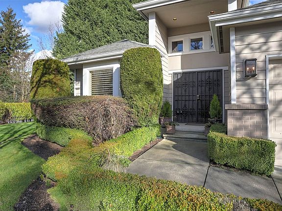 This perfectly updated 2,380SF condo radiates curb appeal.>