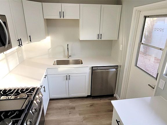 Completely renovated kitchen with designer cabinets and hardware, LG Energy star appliances. The large eastern facing windows drench the space with natural light.