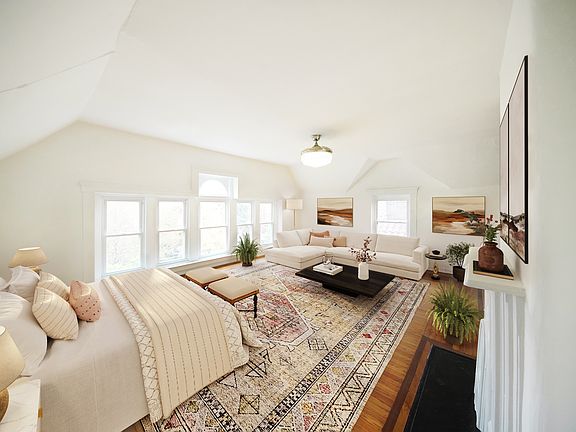 Third floor home, bedroom/living room staged.