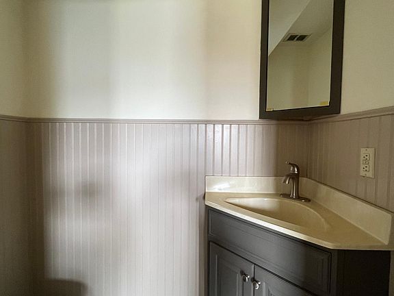 Powder room has been completely renovated as well