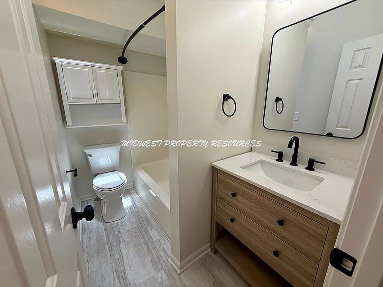 1708 NE Stonewood Dr — Photo 15