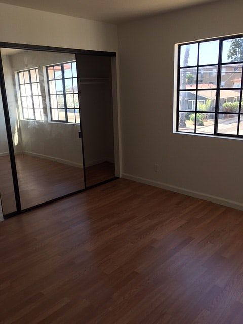 Other bedroom with mirror closet door
