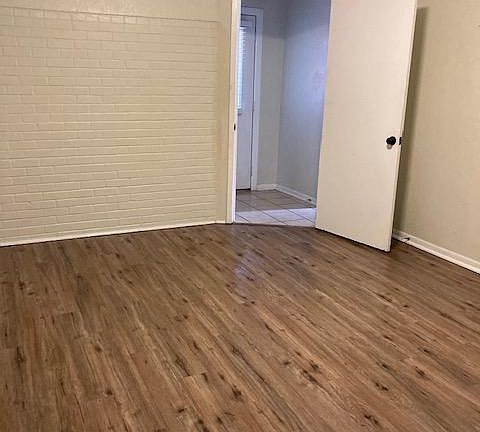 Master Bedroom - door to outside front yard is outside the bedroom door