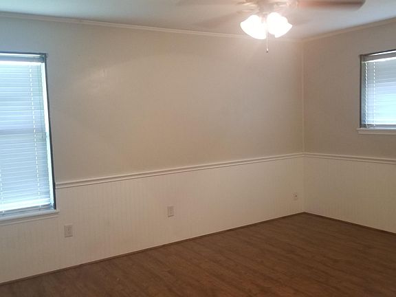 Master Bedroom has 2 windows with white faux wood blinds. This Master Bedroom could be used as a 2nd Bedroom and then the other Bedroom towards the front of the house could be used as the Master Bedroom.