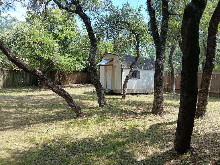 10015 NW Woodland Village Dr — Photo 10