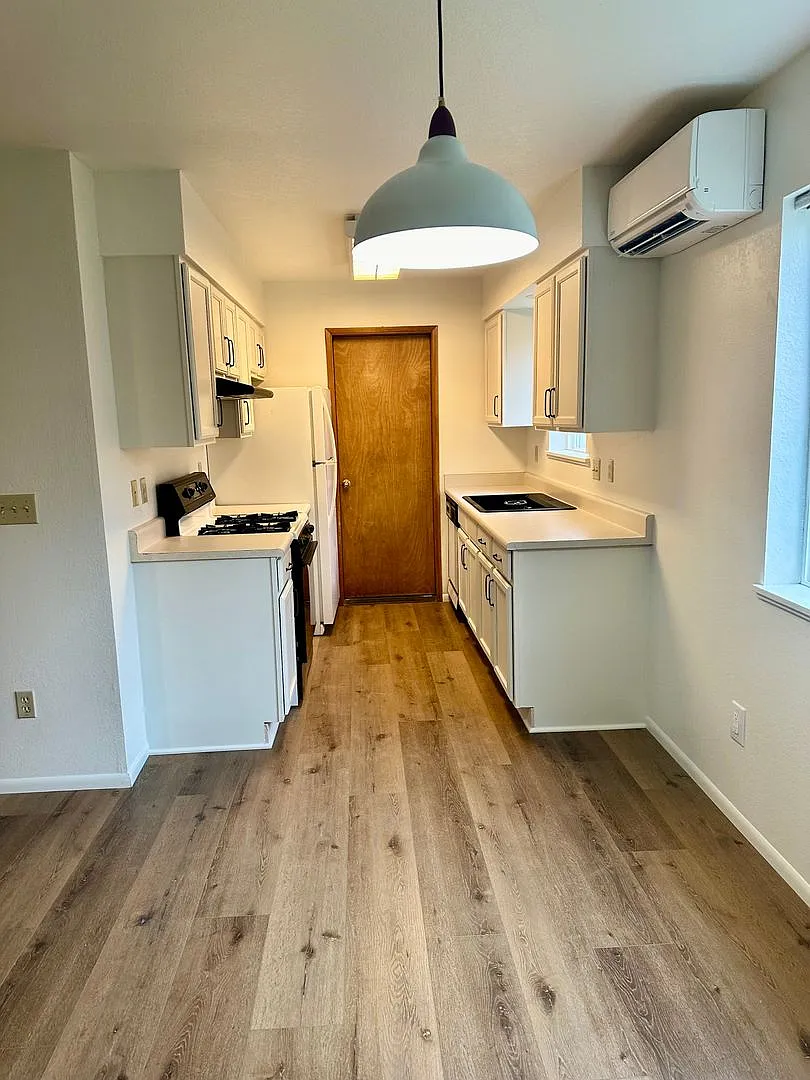 Freshly Updated Home with Garage and Enclosed Porch — Photo 1