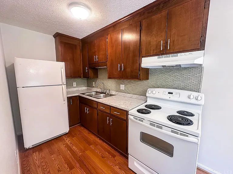 modern updated kitchen with ample cabinet space and functional layout for everyday cooking