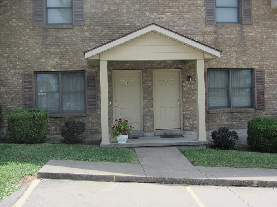 Typical unit entrance with 2 assigned parking places for eac