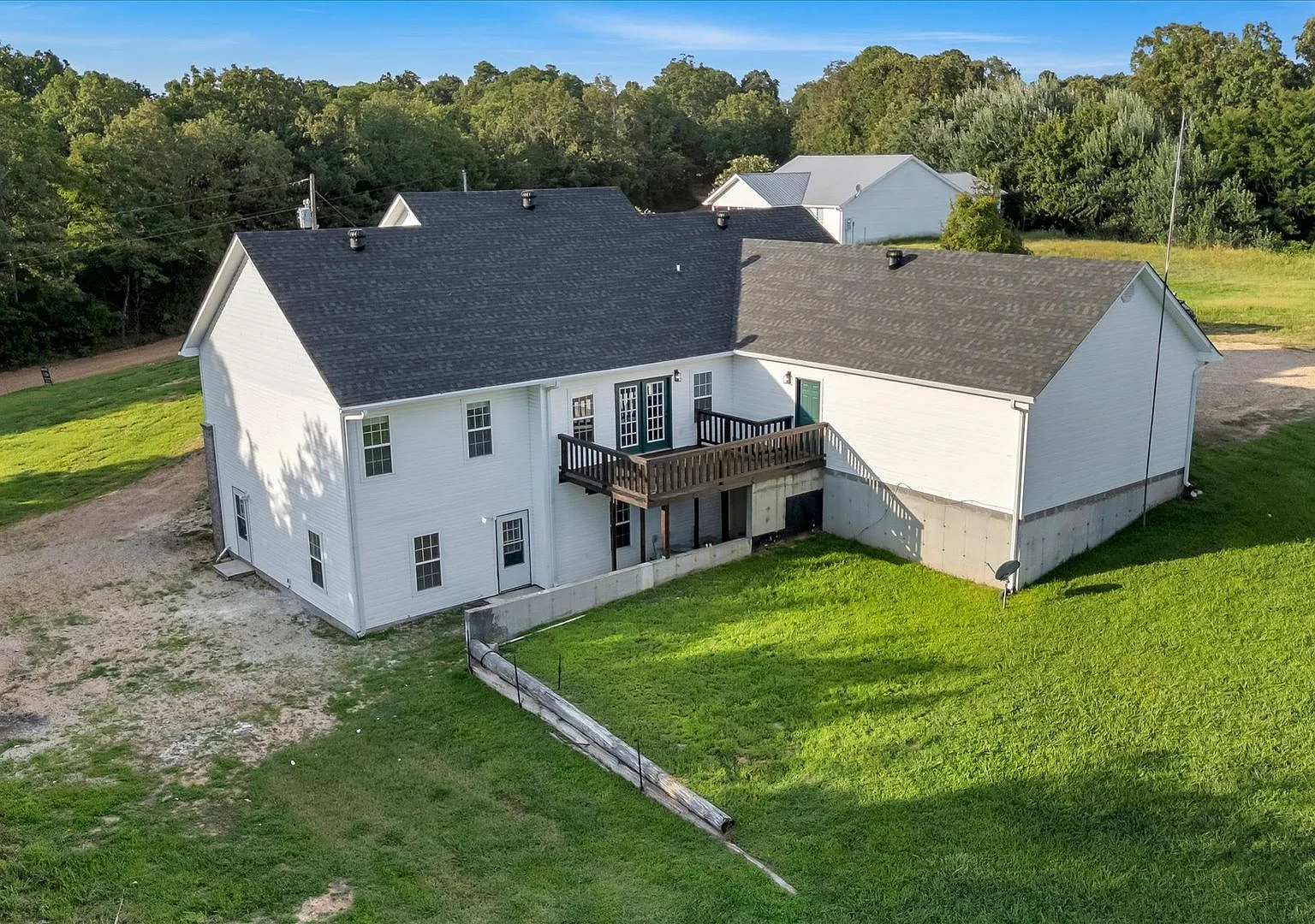 Spacious 5-Bedroom Home on 1.5+ Acres in West Side School District — Photo 4