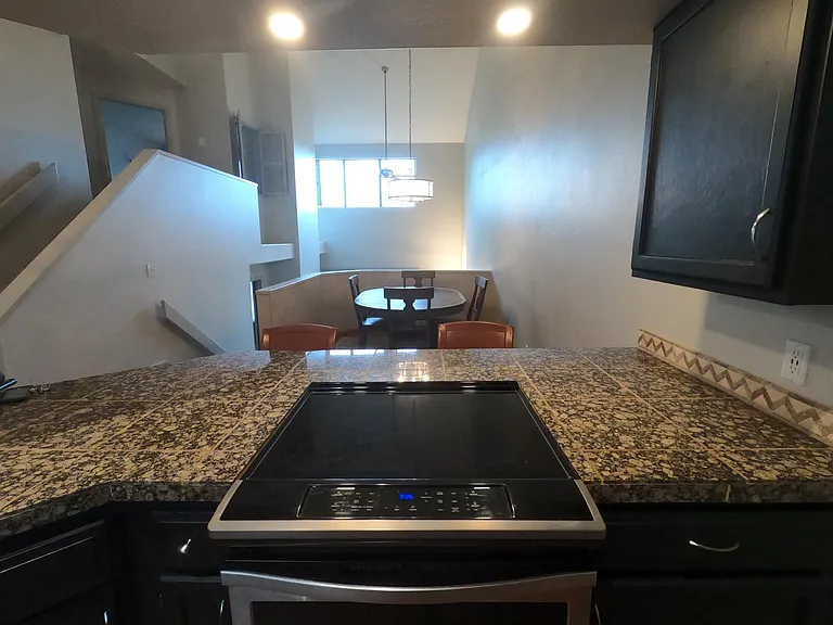 Kitchen overlooking Dining Room and Living Room