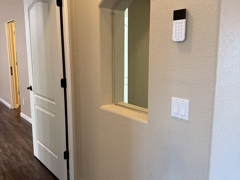 Hallway to primary suite