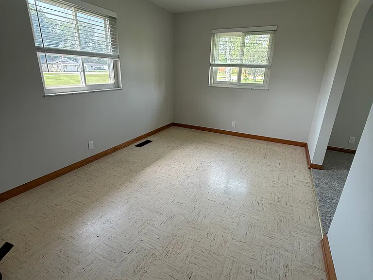 Dining room, office, or play space for kids.