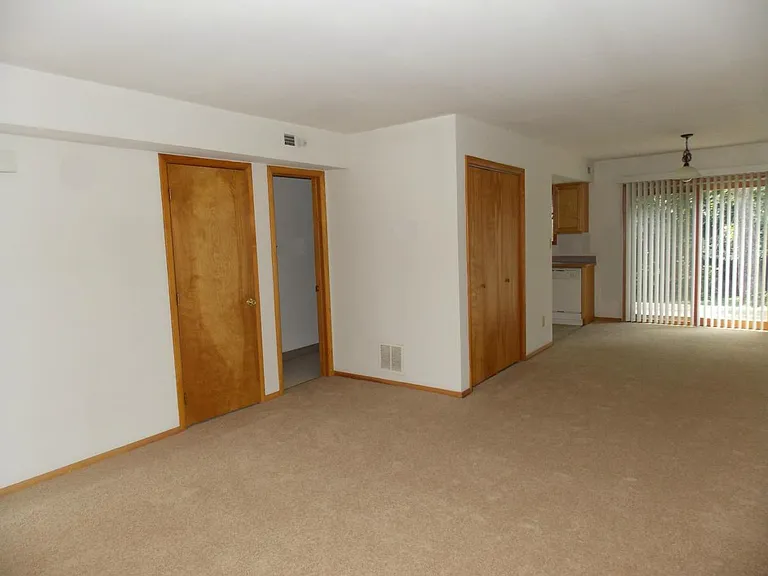 Large living/dining area on the main level with a half bath