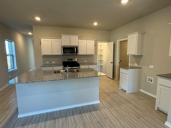 Kitchen- All Home and community information, including pricing, included features, terms, availability and amenities, are subject to change at any time without notice or obligation. All Drawings, pictures, photographs, video, square footages, floor plans, elevations, features, colors and sizes are approximate for illustration purposes only and will vary from the homes as built.