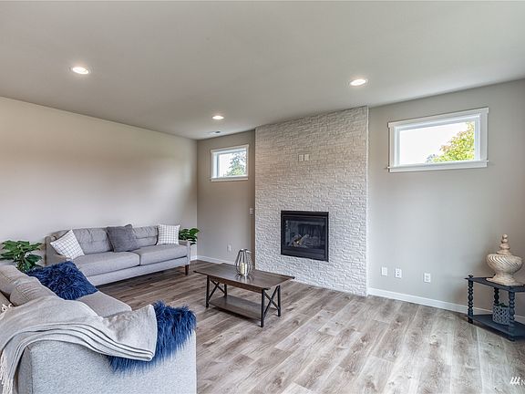 Photo is of the Model Home on Lot 1, the 2535 Sierra plan.  May depict enhancements and / or upgrades that are not available with every plan.>