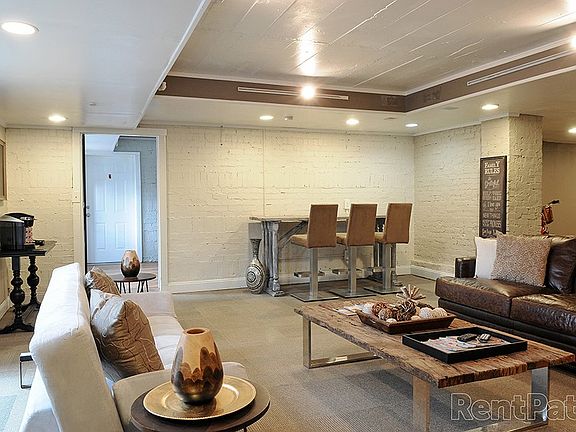 Relaxing resident clubroom with a coffee bar, workspace, and small fitness area_perfect for your morning routine.