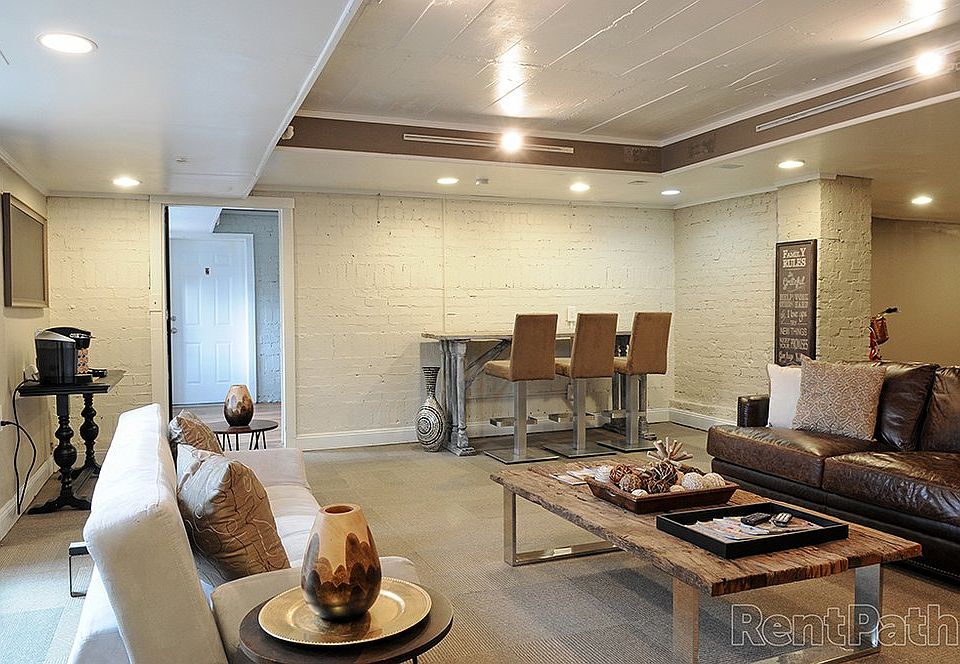 Relaxing resident clubroom with a coffee bar, workspace, and small fitness area_perfect for your morning routine.