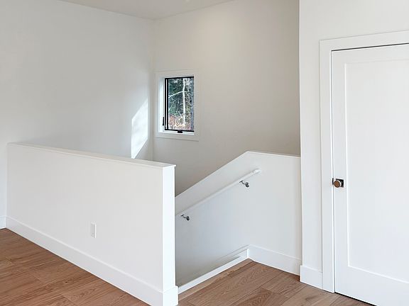 ground level foyer/mud area with private walkup staircase to main living area