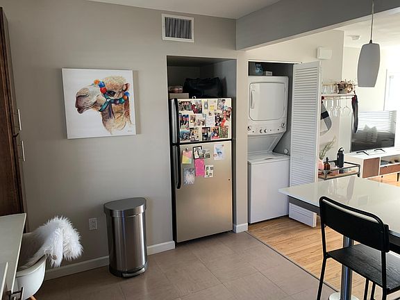 Refrigerator and Washer/Dryer closet.