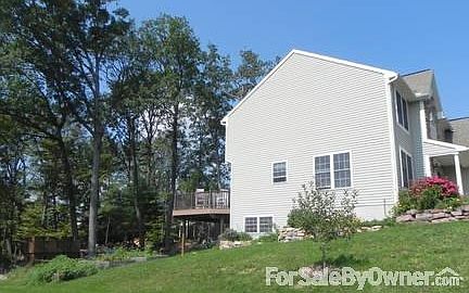 South facing side of home.
						:
						Dry-stack rock walls, apple trees, strawberry plants, full garden.