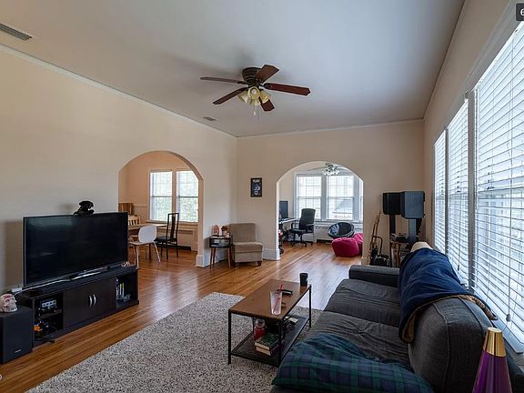Living room view into formal dining (left) and bonus office (right).