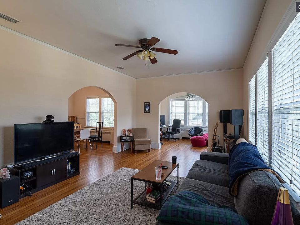 Living room view into formal dining (left) and bonus office (right).
