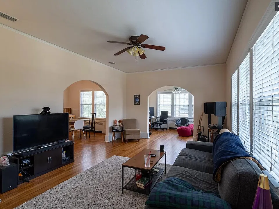 Living room view into formal dining (left) and bonus office (right).