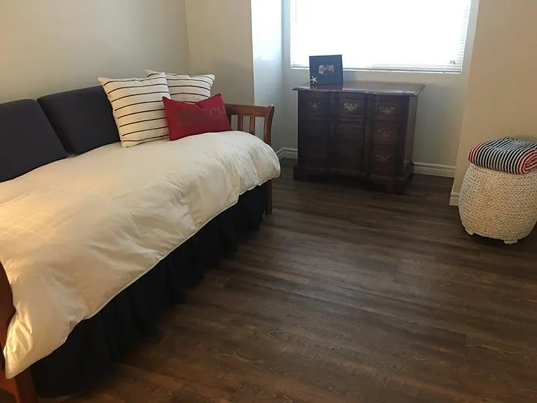 Second bedroom - the apartment is unfurnished but the photos have past owner's furniture.