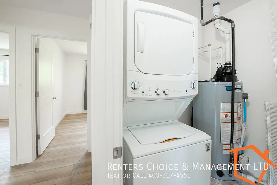 New 2 Bedroom Main Floor Unit With Assigned Parking — Photo 4