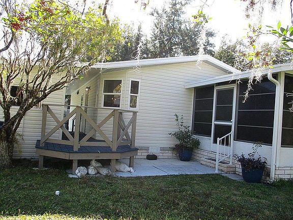 water side back view of home