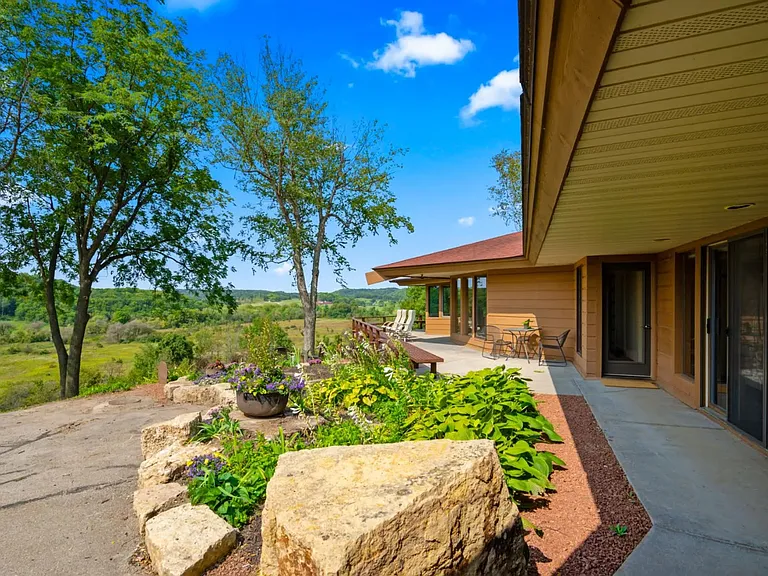 A peaceful outdoor escape with lush greenery and open skies, just steps from your living room.