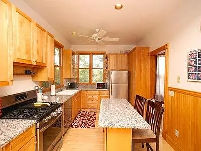 Updated kitchen with granite counters and stainless steel