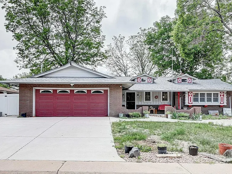 10950 W 71st Pl — Photo 1
