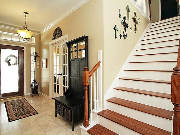 Entry with french doors to study.