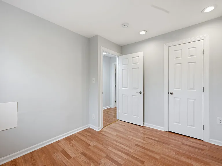 Bedroom with Neutral Paint and Closet Space