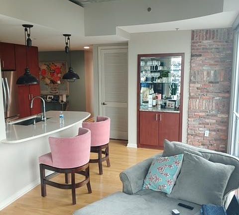 10 Foot Ceilings and brick columns throughout