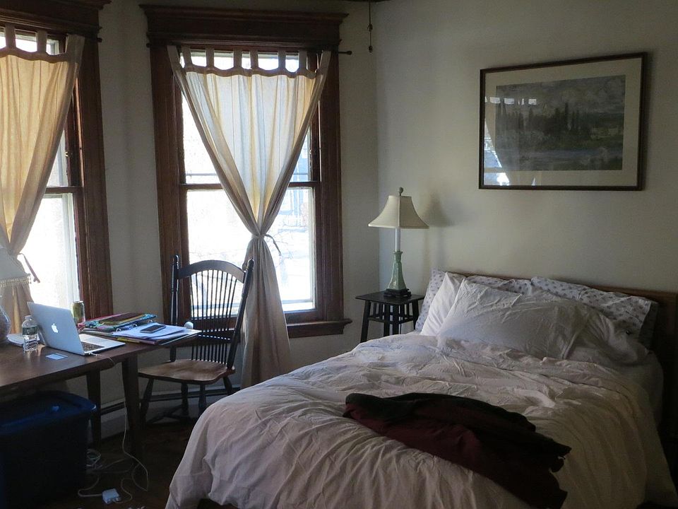 Studio bedroom set-up - room has large windows