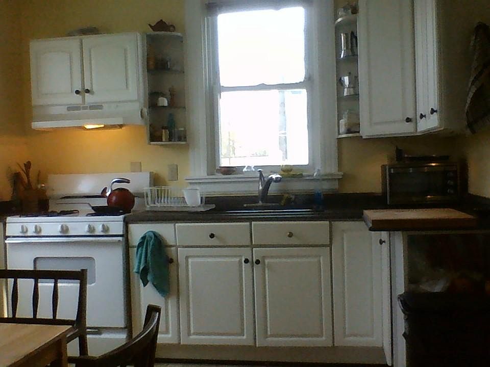 large, eat-in kitchen with a view of the back yard.
