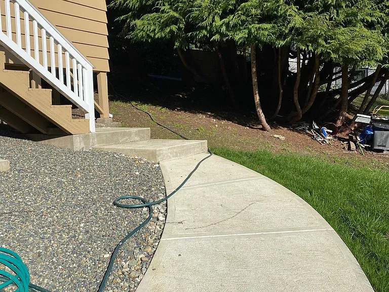Continuation of walkway behind house