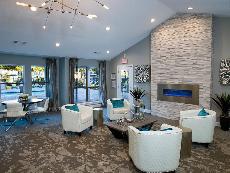 Cozy up by the fireplace in our clubhouse seating areaan invitation to blissful relaxation.