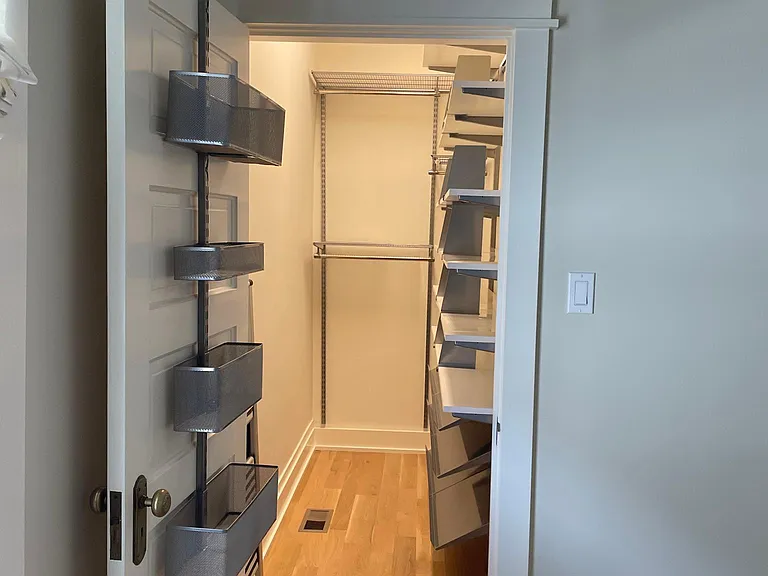 Main bedroom with walk-in closet and Elfa shelving