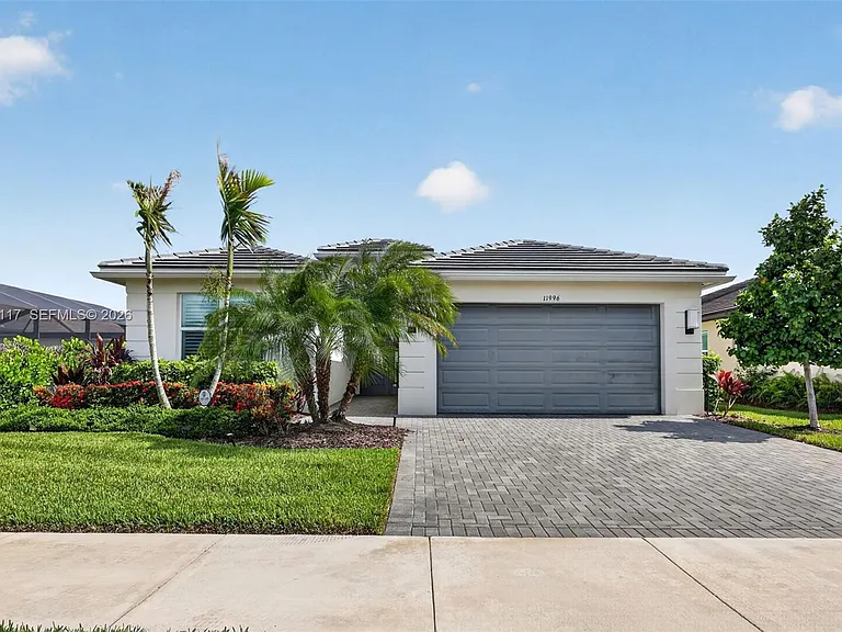 11996 SW Seahorse Springs Ter — Photo 1
