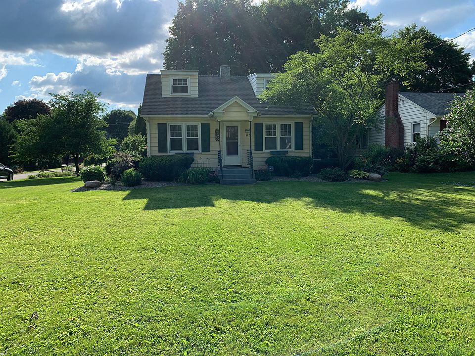 Corner lot with large front yard and private backyard.