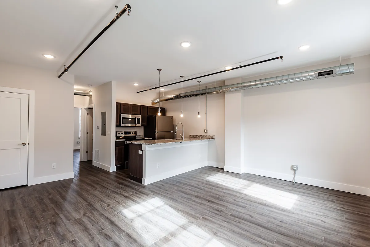 You'll find nice closet spaces, large counter bar, easy care luxury vinyl plank flooring minimal steps in this 1 st floor apartment. - 722 E McMillan St #3