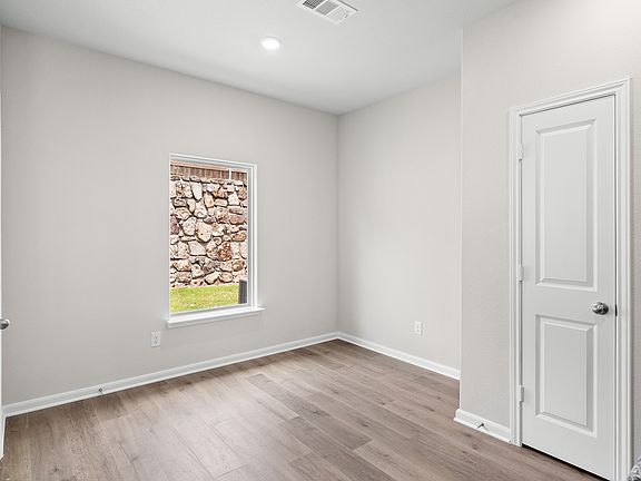 The dining room has a window that lets in great, natural light.