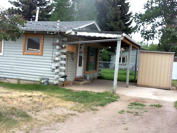 Covered patio, shed, parking pad